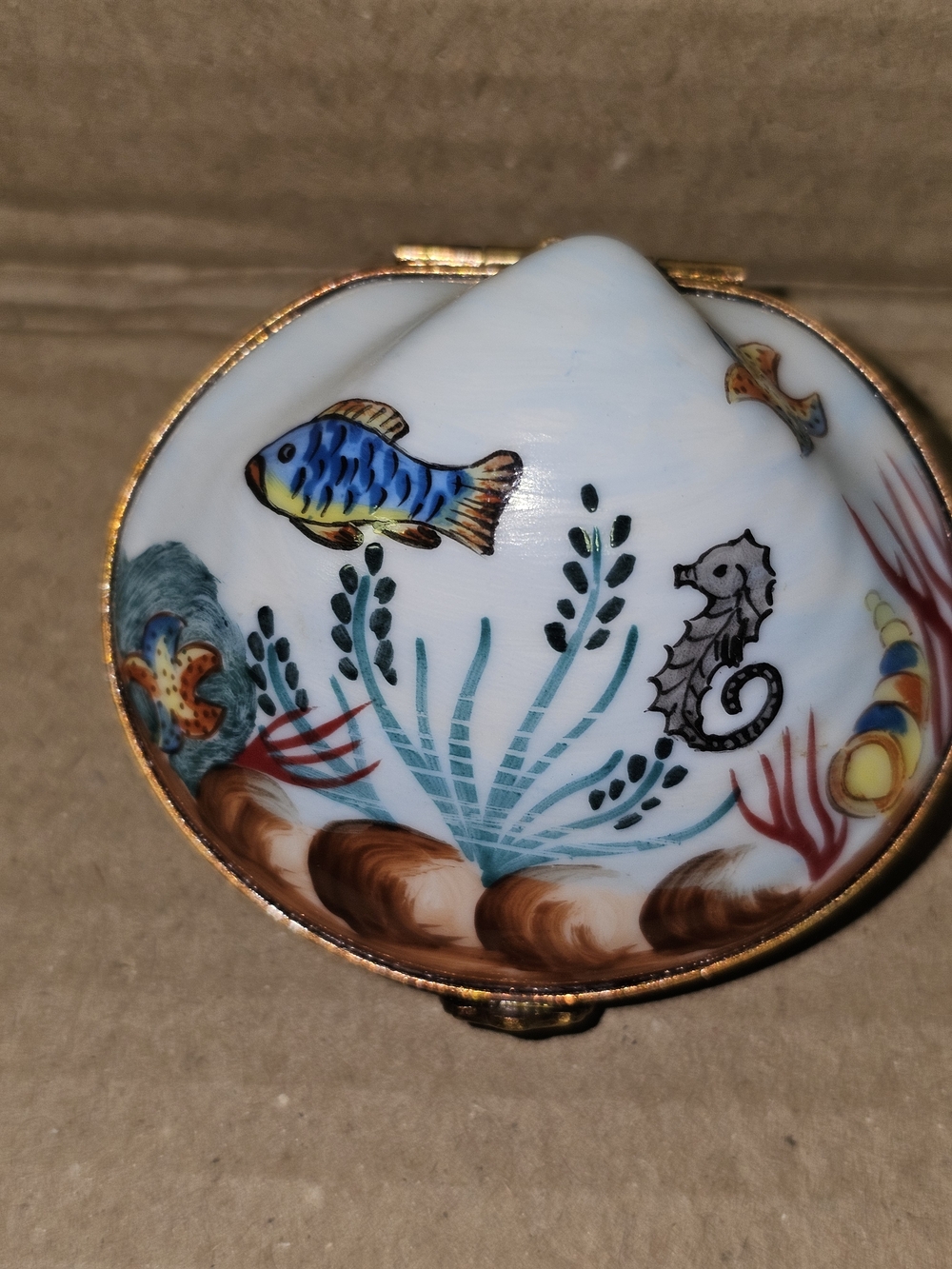 The Limoge, France Enamel clam with a pearl interior